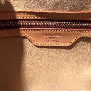 Purses Gucci bag and a louis Vuitton bag